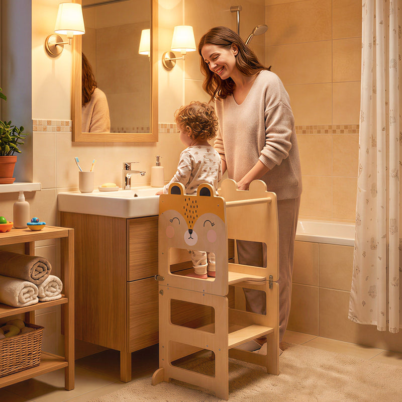 Toddler using the fox-shaped step stool to reach a bathroom sink with a parent