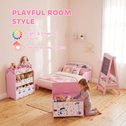 Pink toy chest in a kids room beside a matching bed and easel