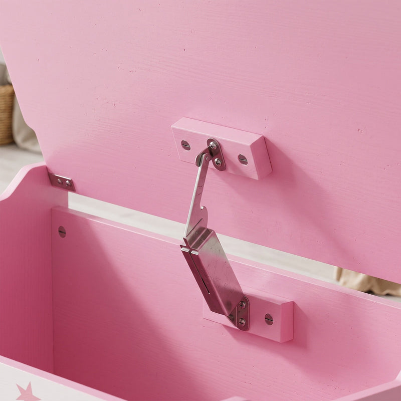 Close-up of the security hinge supporting the open lid of the pink toy chest