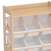 Close-up of white plastic bins resting on the pine frame
