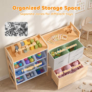 Storage graphic labelling the 2 open shelves, 9 storage boxes, 2 fabric drawers and solid wood drawer