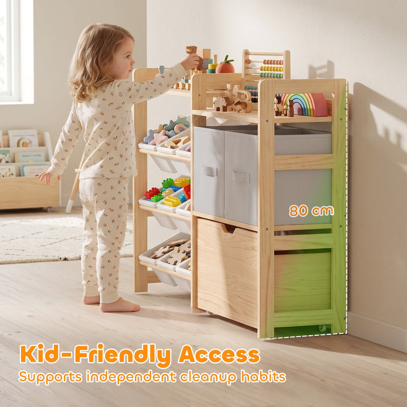 Child reaching for toys on the storage unit with the 80 cm height marked