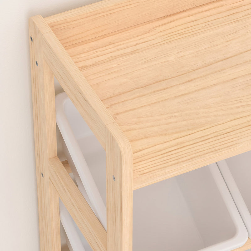 Close-up of the pine top shelf corner and wooden frame