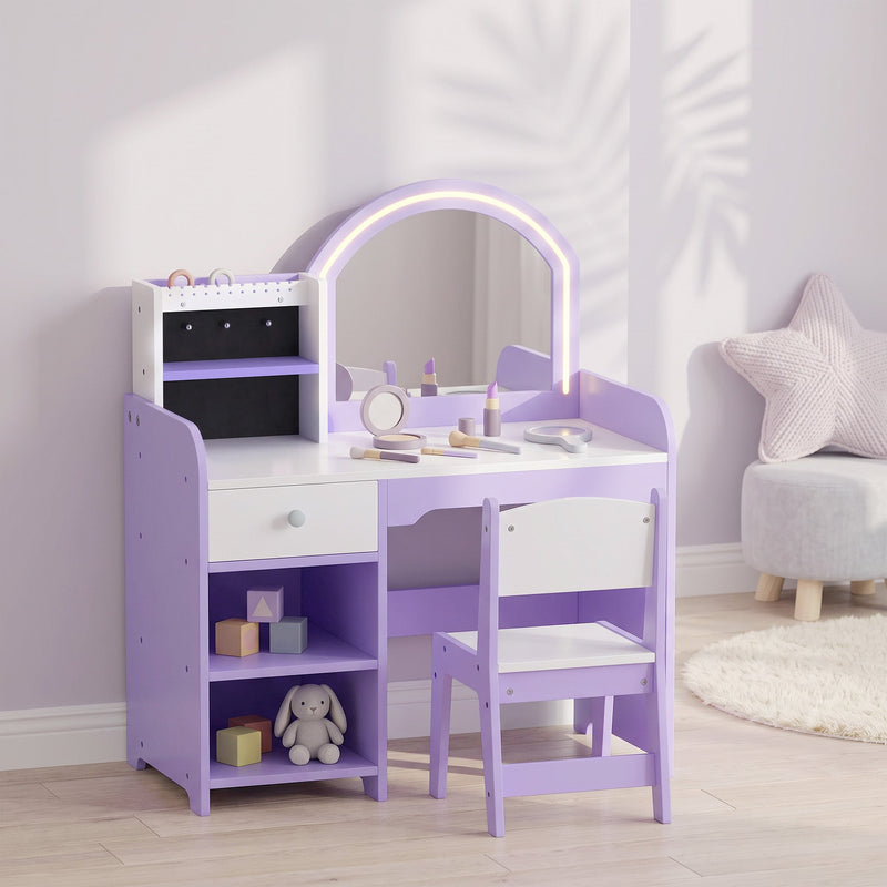 Purple kids vanity set styled in a bedroom with toy shelf
