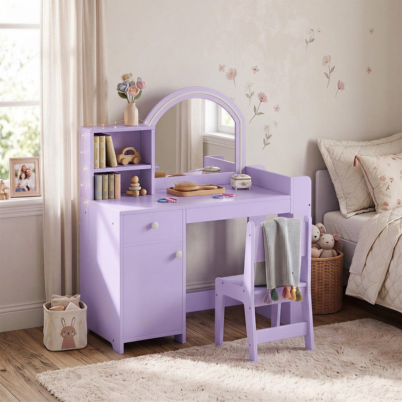 Purple vanity table and chair styled in a child's bedroom beside a bed