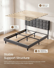 Wood slat panel raised above the slate grey king bed showing the metal frame and support legs