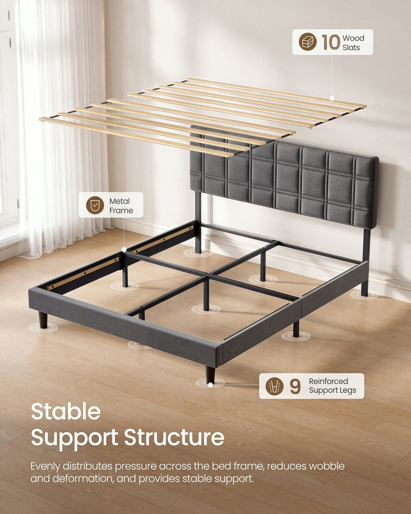 Wood slat panel raised above the slate grey king bed showing the metal frame and support legs