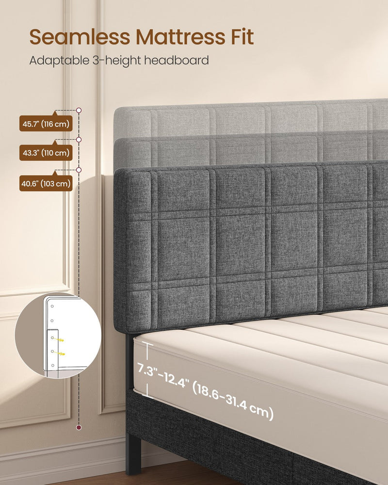 Close-up of the slate grey headboard beside markers for its adjustable height settings