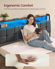 Woman sitting up in bed against the 95 degree inclined padded headboard