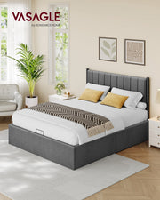 The made-up king bed in a bright bedroom with a white nightstand and yellow cushions