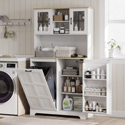 Cupboard used in a utility room beside a washing machine, holding towels and toiletries