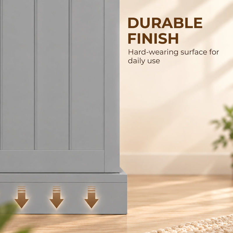 Close-up of the painted grey door panel and base of the pantry cabinet