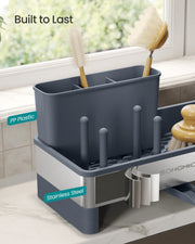 Close-up showing the sink caddy's PP plastic insert and stainless steel tray materials
