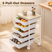 All 5 drawers pulled out and filled with fruit, vegetables and store-cupboard jars