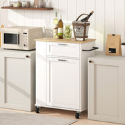 White kitchen trolley styled between cabinetry with wine glasses and bottles on top