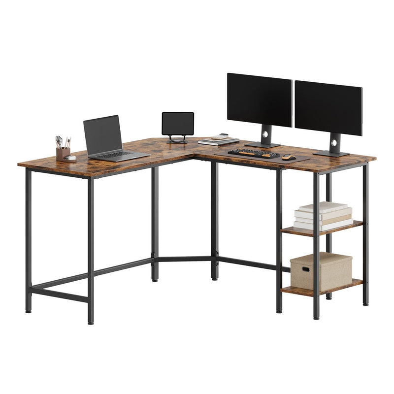 Vasagle L-shaped computer desk in rustic brown and ink black, set up with a laptop, tablet and two monitors on a white background