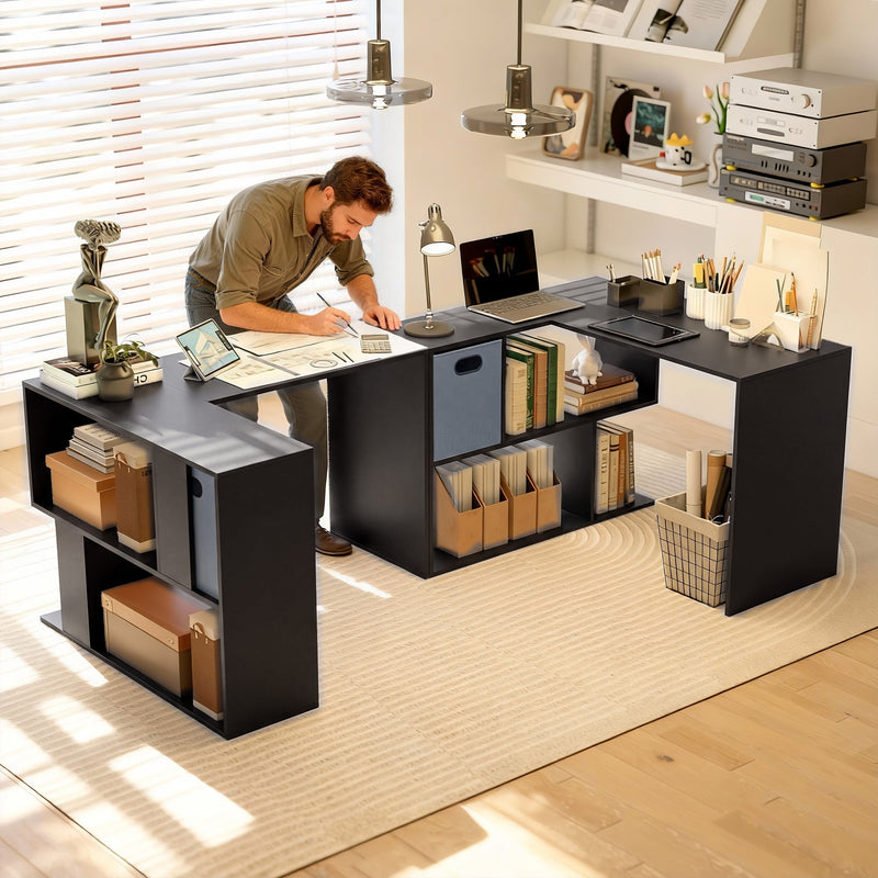 Man working at the L-shaped desk in a bright home office setting