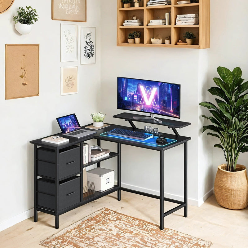 Ebony black L-shaped computer desk set up in a home office with laptop and monitor