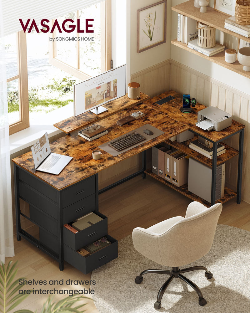 Rustic brown and matte black L-shaped desk in a room setup with a monitor on the stand and two drawers pulled open