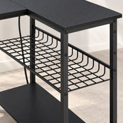 Close-up of the mesh shelf with side hooks and bottom shelf on the black gaming desk