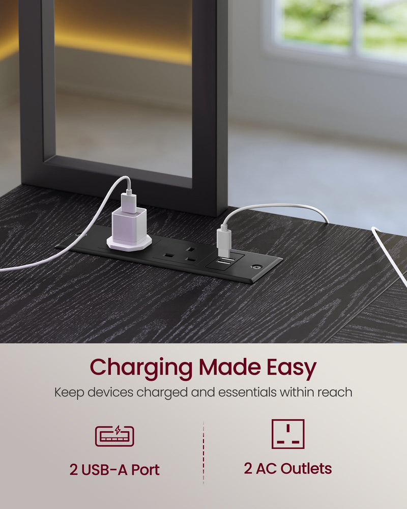 Close-up of the built-in desktop power strip with 2 UK sockets and 2 USB-A ports