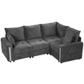 Dark grey velvet L shaped sofa with reversible corner, front view on white