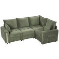 Dark green velvet L-shaped sofa with a reversible corner, studio view