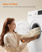 Feandrea dog blanket being loaded into a washing machine for a cold machine wash