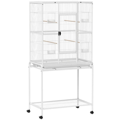 White large bird cage on a wheeled stand with a bottom shelf on a white background