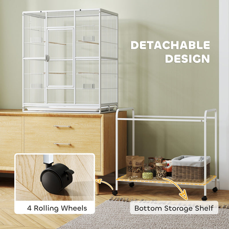 Cage lifted off its wheeled stand to show the detachable design and a caster close-up