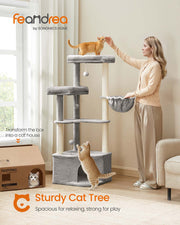 Cat resting inside the cave of the large Feandrea cat tree tower