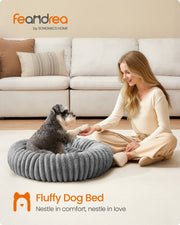 Lifestyle photo of a dog resting in the Feandrea dove grey pet bed beside its owner in a living room
