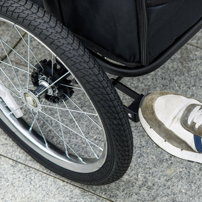 Large dog stroller wheel and brake close-up