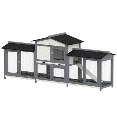 Grey and white rabbit hutch on a plain background with side run boxes and a black asphalt roof