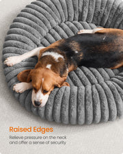 Close-up of a dog leaning against the raised rim edge of the Feandrea dove grey pet bed
