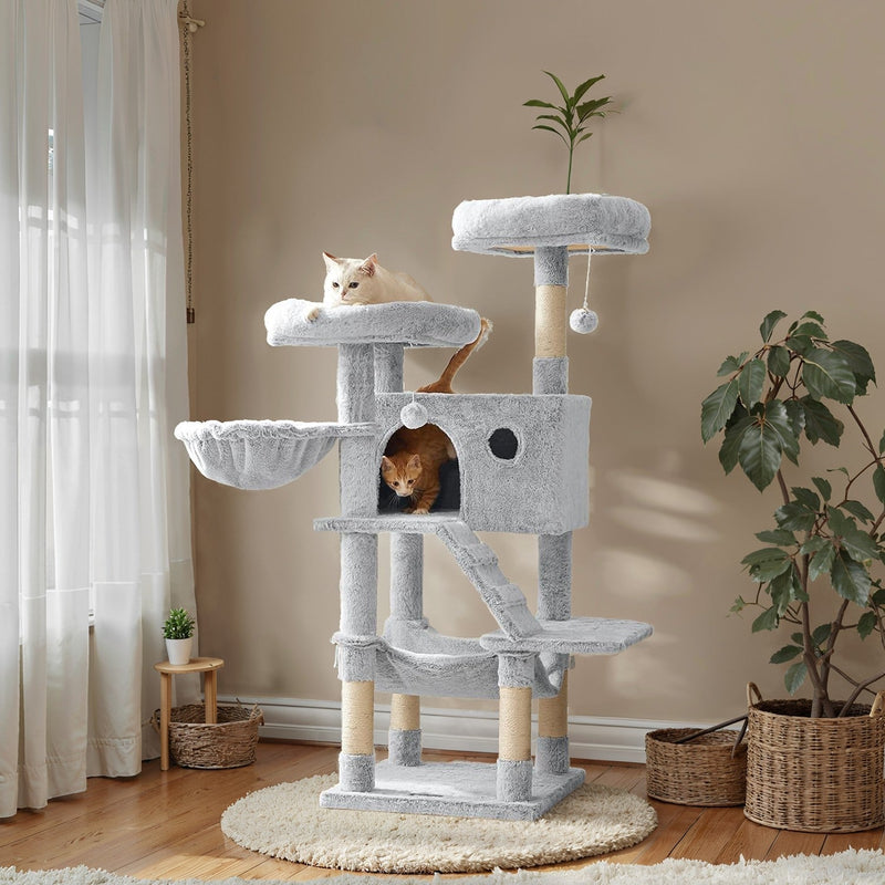 Large white-grey cat tree tower by Feandrea with cats on the top perch