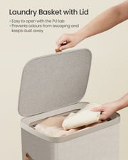 Close-up of laundry basket lid opening with PU tab handle