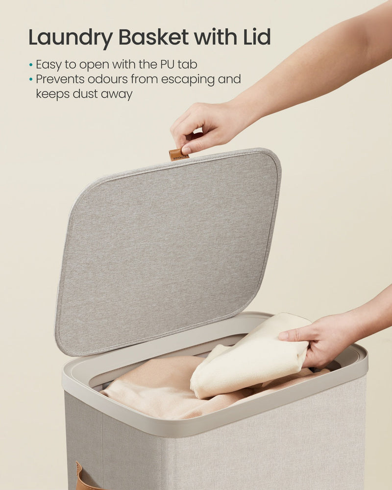 Close-up of laundry basket lid opening with PU tab handle