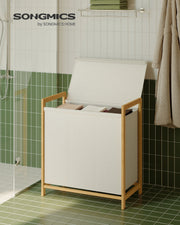 Songmics bamboo laundry hamper in a bathroom setting with lid open