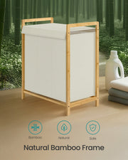Natural bamboo frame of the laundry hamper shown with a bamboo forest background