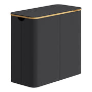 Ink black SONGMICS laundry hamper with bamboo rim and the lid closed, seen from the front corner