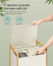 Close-up of the 2-compartment laundry hamper with lid open showing sorted light and dark clothes