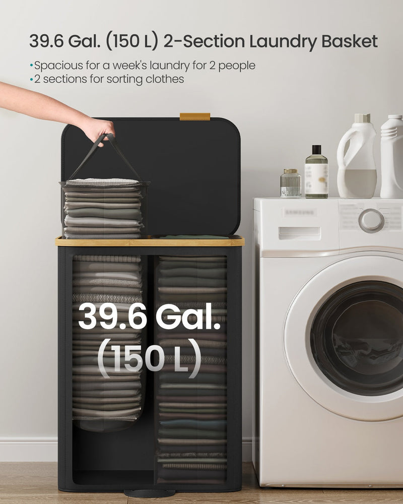 Ink black 2 section laundry hamper standing beside a washing machine, labelled 150 litres