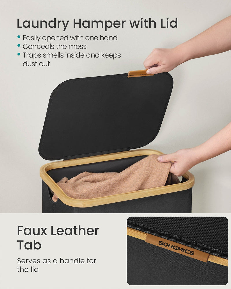 Close-up of hands opening the laundry hamper lid using its faux leather tab handle
