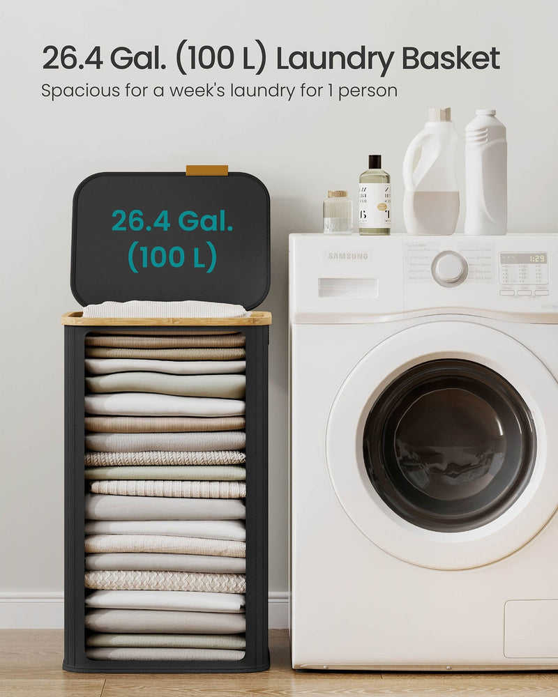 Laundry hamper shown beside a washing machine highlighting its 100 litre capacity