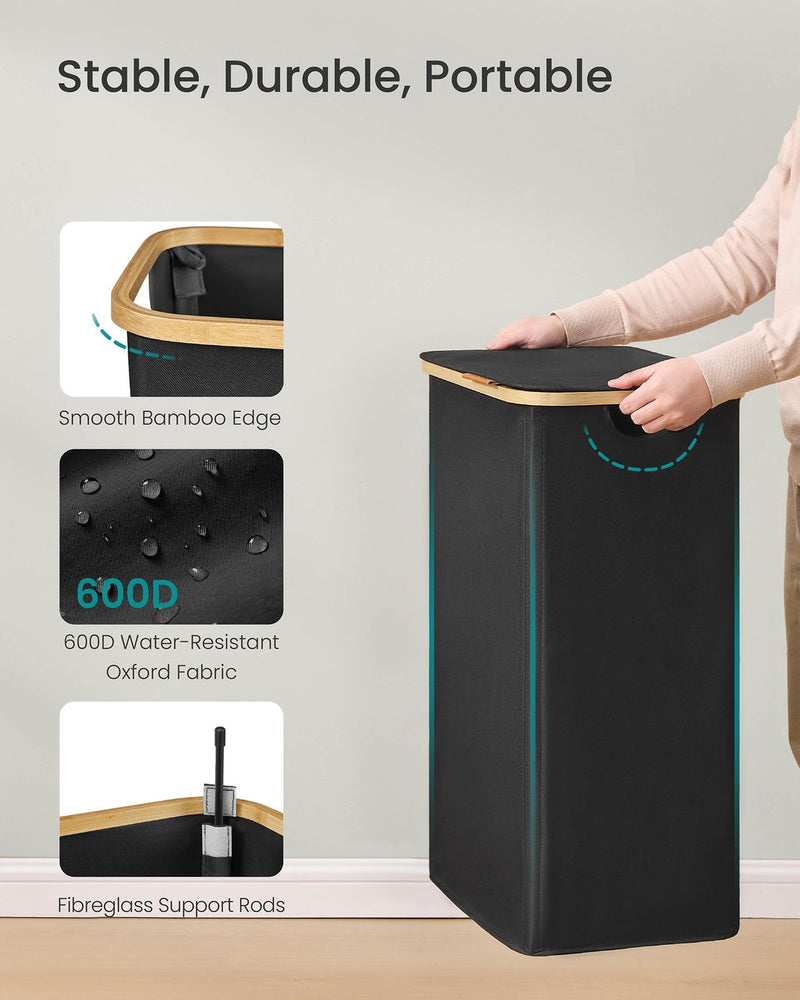 Close-up of the hamper's smooth bamboo edge, 600D water-resistant Oxford fabric, and fibreglass support rods