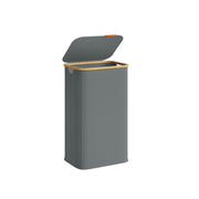 Slate grey laundry hamper studio shot from a front angle showing the bamboo-trimmed lid