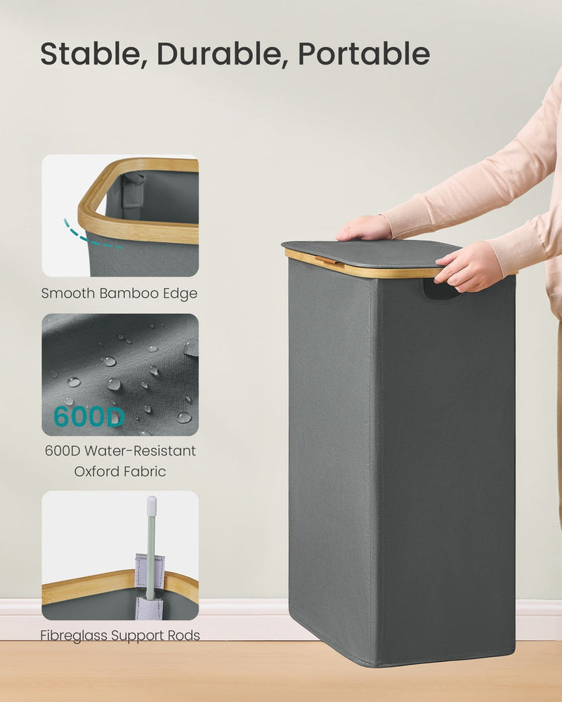 Close-up of the hamper's smooth bamboo edge, 600D water-resistant Oxford fabric, and fibreglass support rods