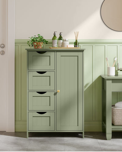 Laurel Green bathroom cabinet styled in a green bathroom with plants and toiletries on top