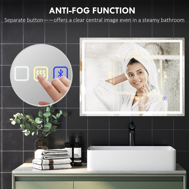 Anti-fog demister function shown clearing a steamed section of the mirror